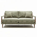 Green patterned fabric sofa with wooden armrests and two cushions 180 x 85 x 70cm